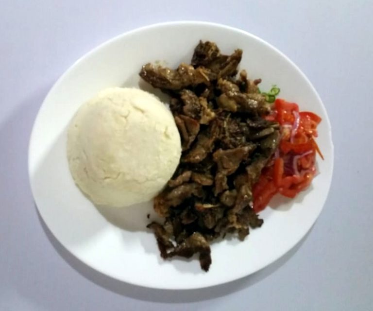 ugali njama choma kachumbari at Safari Inn Restaurant Bar Mombasa Kenya